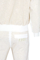 Kash Crystal Track Jacket with Hamso Logo 2.0 Elastic Waistband Drawstring closure Color: White and Gold Crystals 100% Polyester Wrinkle Free Material Fits true to size