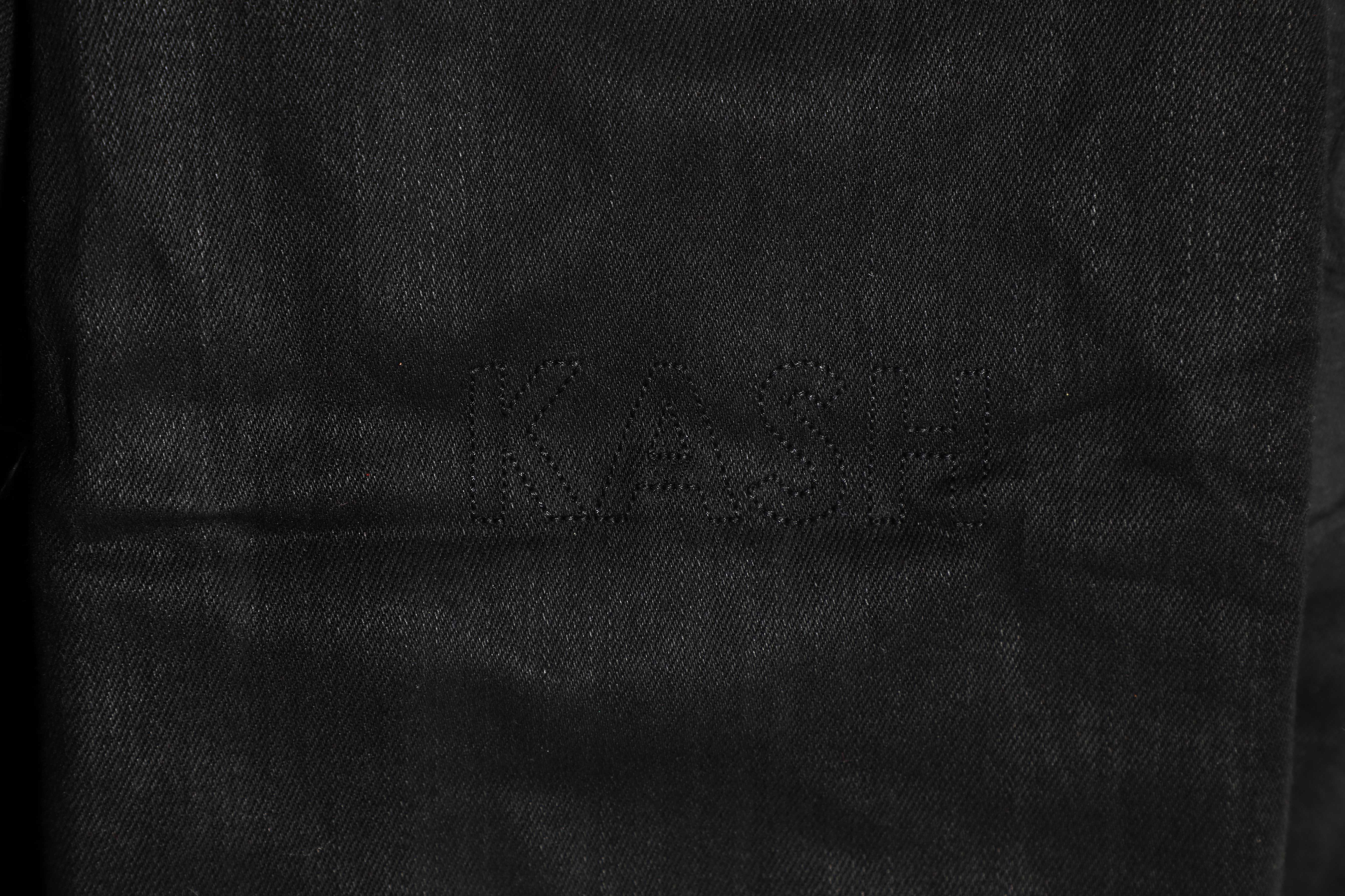 Made of the most luxurious fabrics in the world and worn by international celebrities, KASH is the essence of low-key luxury. The Hamsa, which adorns each Kash design is a universal sign of blessings and protection from the evil eye so you can shine uninterrupted.      Five pockets     Belt loops     Color: Black     Fits true to size     Leather patch KASH on back     Front Small metal  Logo     Removable large 3D Hamsa Fob attached     Fabric: 98% cotton, 2% lyrca